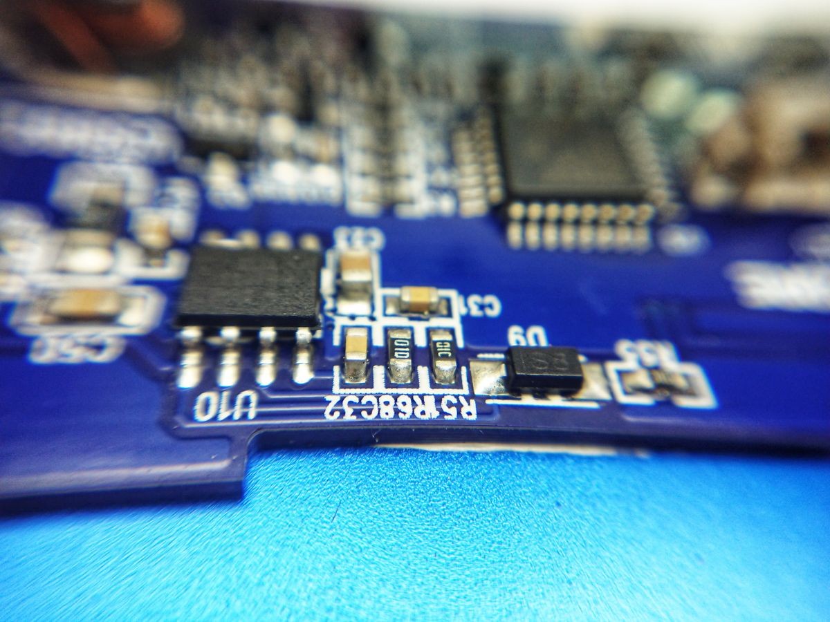 Broken of blue circuit board macro shot